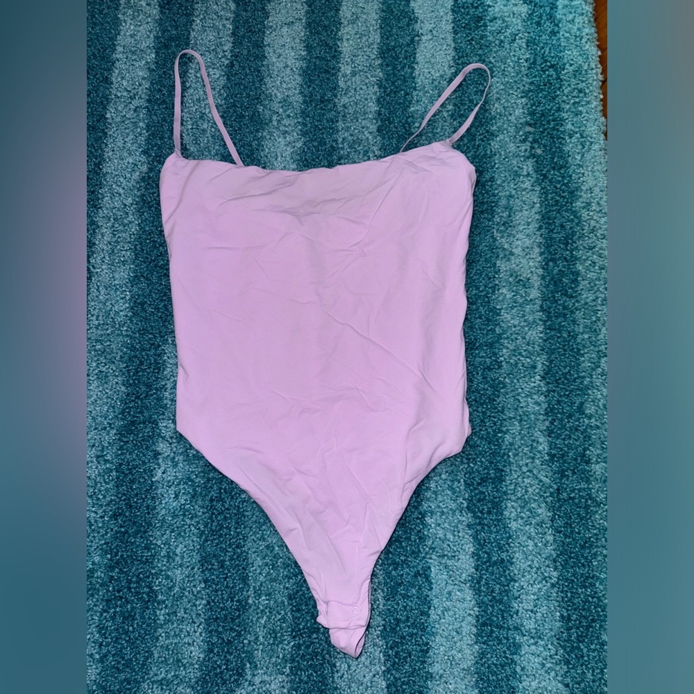 Skims tank thong bodysuit. Washed once never worn! No flaws!